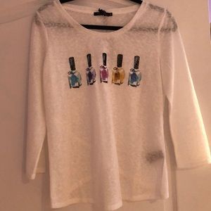 white long sleeve shirt with nail polish design